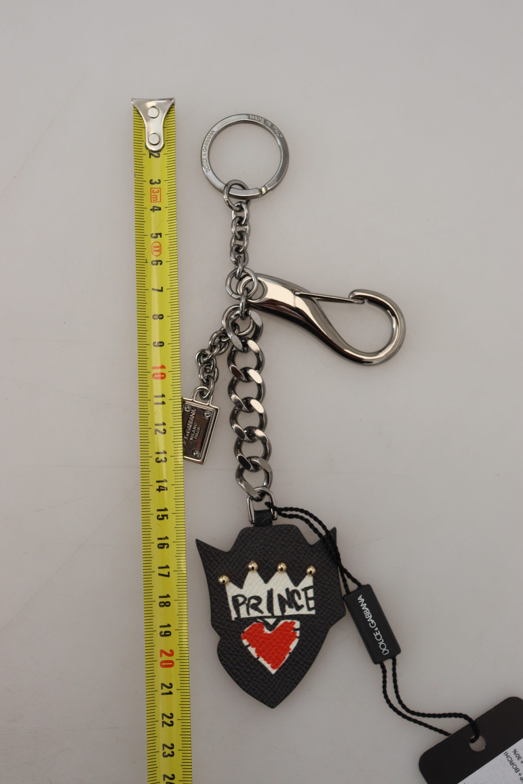 Dolce & Gabbana Black Prince Nyckelring i silvermässing med nitar och logotyp