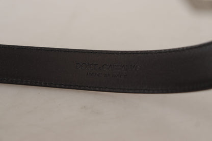 Dolce &amp;amp; Gabbana Svart Kalvskinnsbälte med Graverad Metallspänne och Logotyp