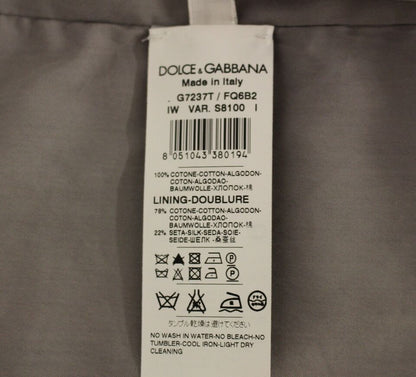 Dolce &amp;amp; Gabbana Grå bomullsklänning med smal passform och knappar framtill