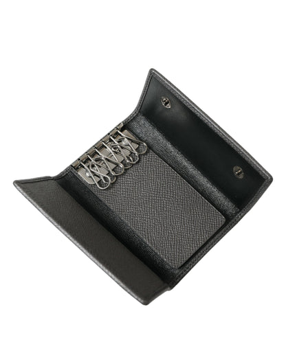 Dolce &amp;amp; Gabbana Nyckelring i grått läder med silverfärgad metall och logotypplack, trefaldig
