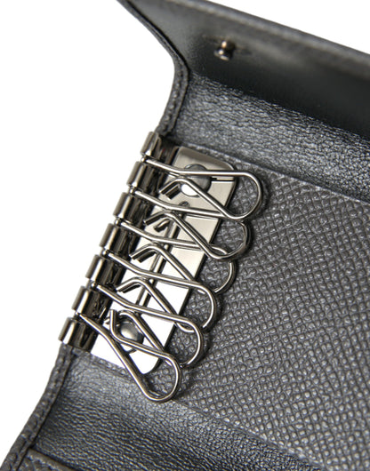Dolce &amp;amp; Gabbana Nyckelring i grått läder med silverfärgad metall och logotypplack, trefaldig