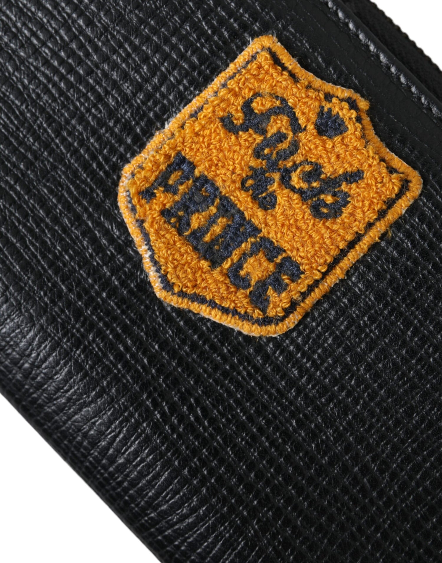 Dolce &amp;amp; Gabbana svart läderplånbok med logotyp och dragkedja runtom
