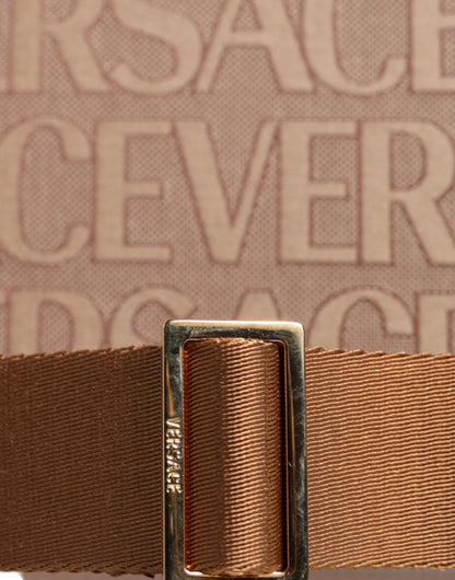 Versace brun axelväska i jacquardläder med logotyp och topphandtag