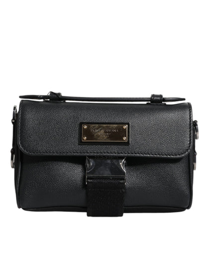Dolce &amp;amp; Gabbana svart logotypplack i läder med spänne och axelremsväska