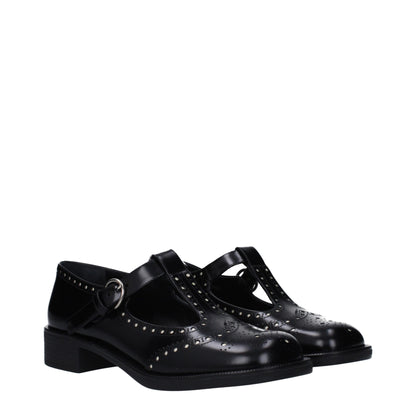 Miu Miu svarta slip-on loafers i läder